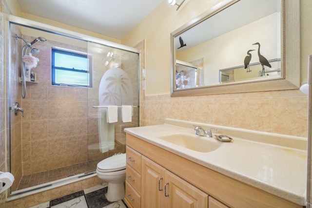 bathroom with tile flooring, an enclosed shower, oversized vanity, and toilet