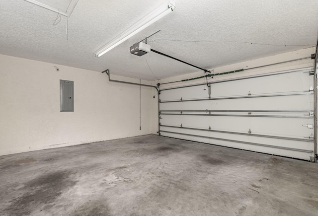 garage featuring electric panel and a garage door opener