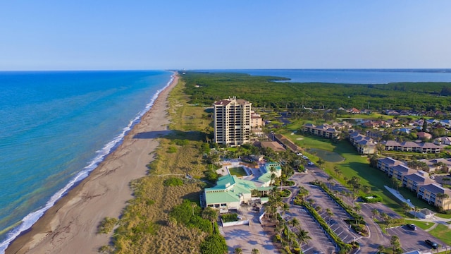 bird's eye view with a beach view and a water view