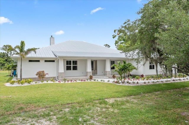 view of front of house with a front lawn