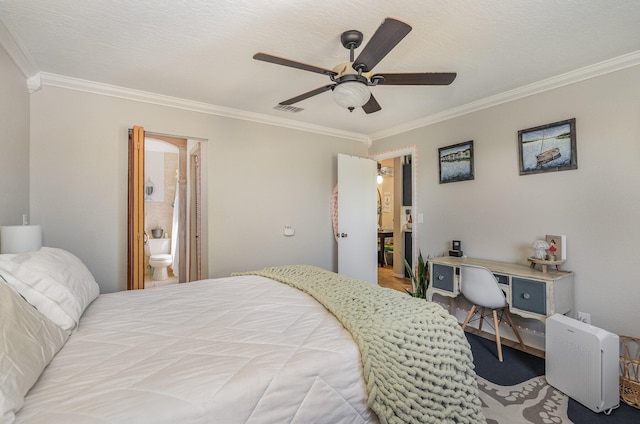 bedroom with crown molding, ceiling fan, and ensuite bath