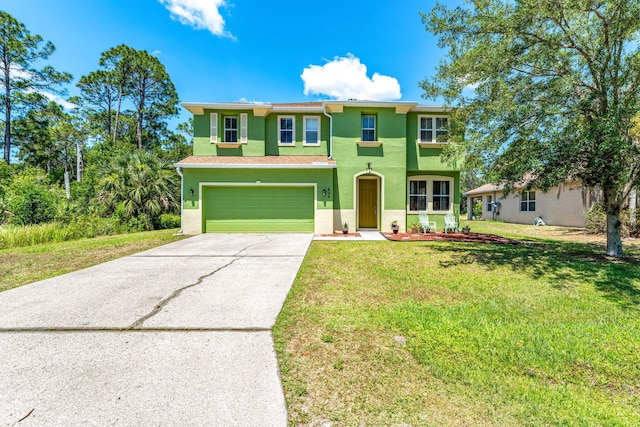 view of front of house featuring a garage and a front yard