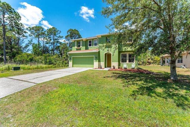 view of front of property featuring a garage and a front lawn