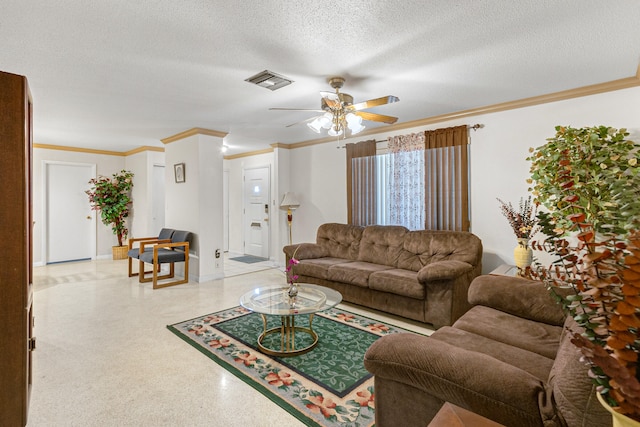 living room with ceiling fan, a textured ceiling, and crown molding