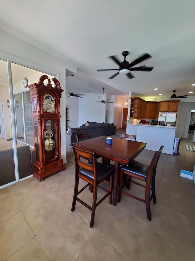 dining area with light tile patterned floors