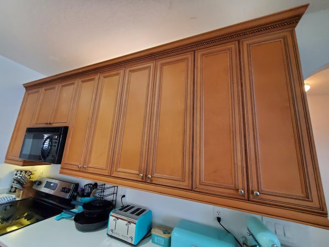 kitchen with stainless steel electric stove