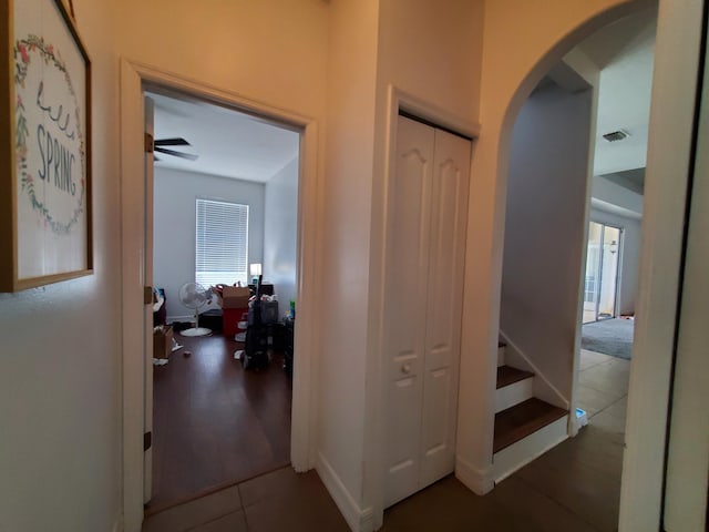 corridor featuring tile patterned floors