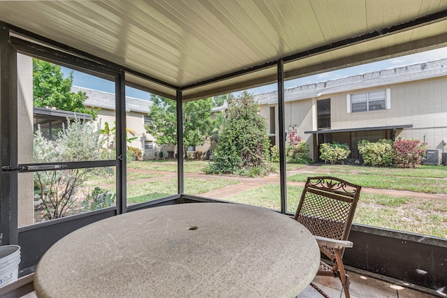 sunroom / solarium with wood ceiling