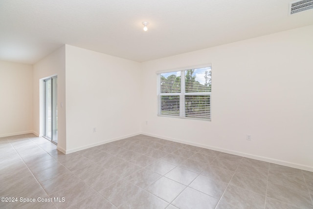 view of tiled empty room