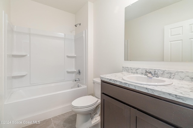 full bathroom featuring tile patterned flooring, vanity, toilet, and shower / washtub combination