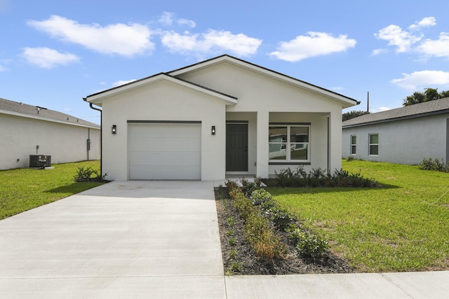 ranch-style house featuring a front lawn, a garage, and central AC unit