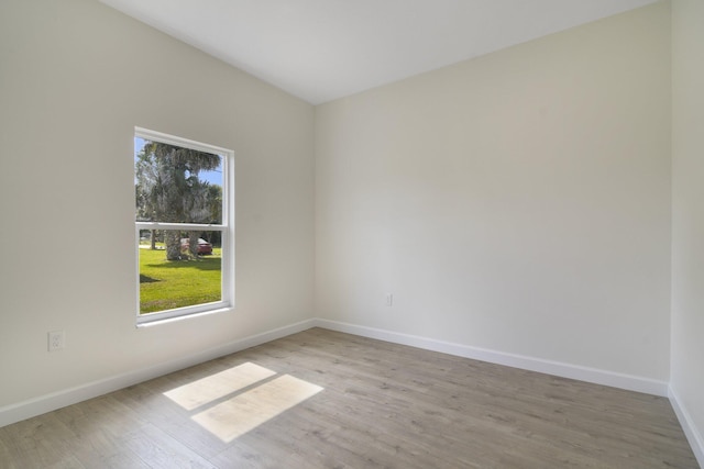 unfurnished room featuring light wood-type flooring