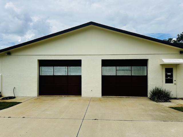 view of home's exterior with a garage