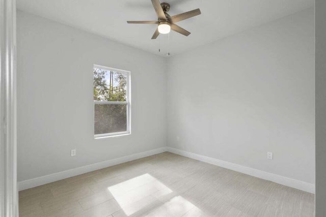 spare room featuring ceiling fan