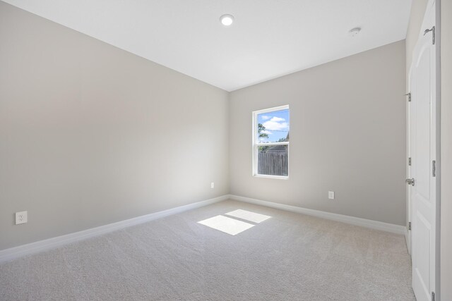 view of carpeted spare room