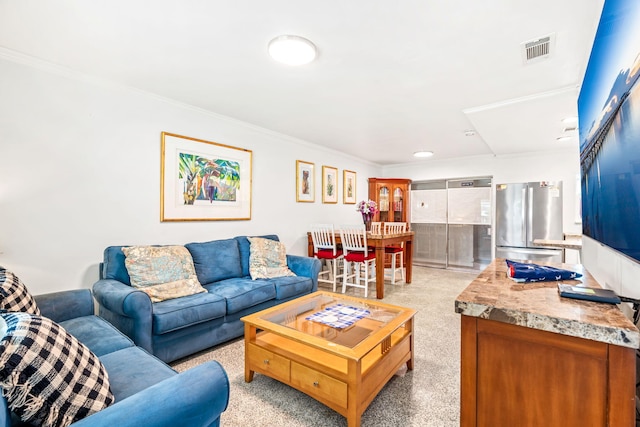 carpeted living room featuring crown molding