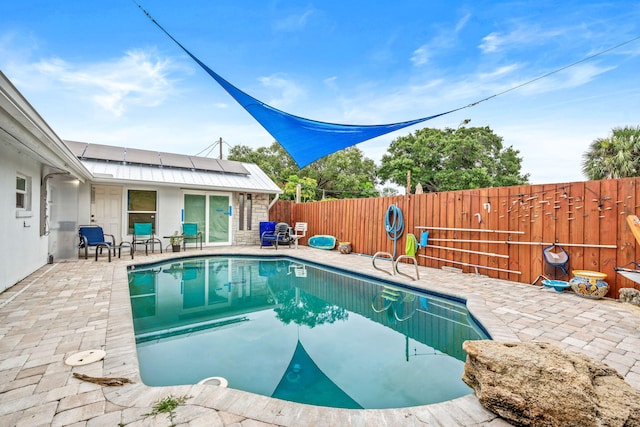 view of pool featuring a patio area