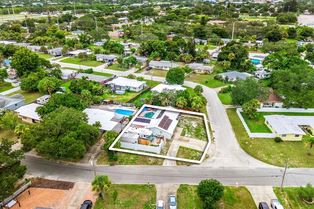 1557 Hillcrest Dr, Melbourne, FL 32935 - aerial view with a residential view
