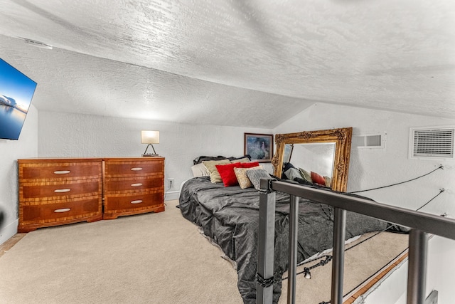 bedroom with carpet, lofted ceiling, and a textured ceiling