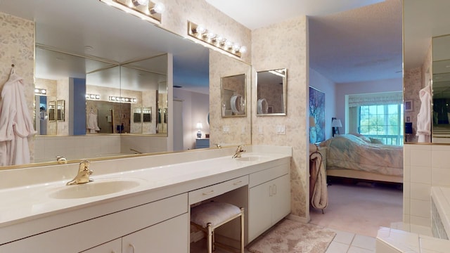 bathroom featuring tile patterned floors and vanity