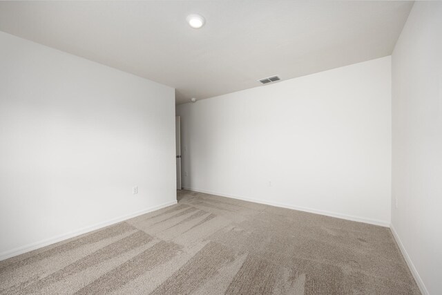 unfurnished room featuring carpet floors