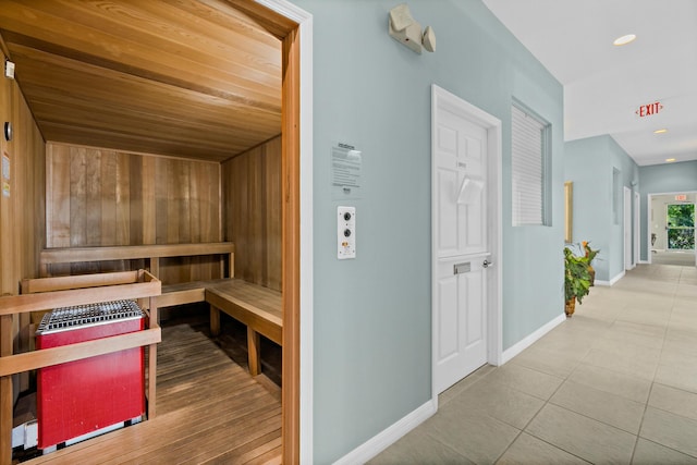 view of sauna with recessed lighting, baseboards, and tile patterned floors