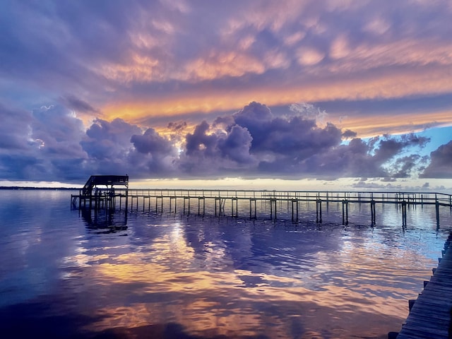 view of dock with a water view