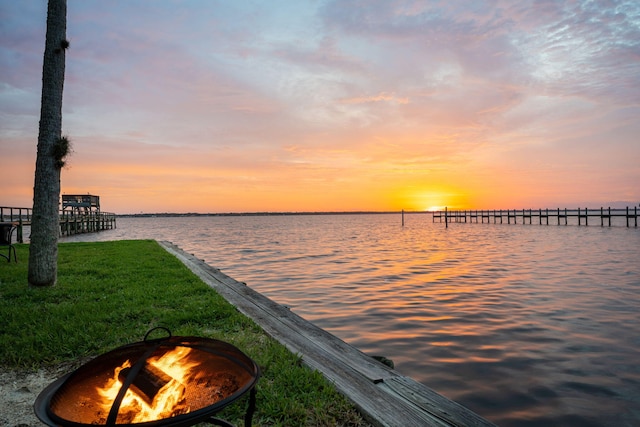 water view with an outdoor fire pit