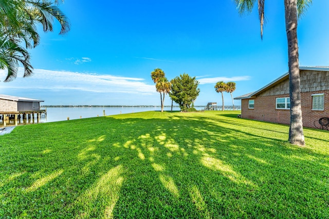 view of yard with a water view