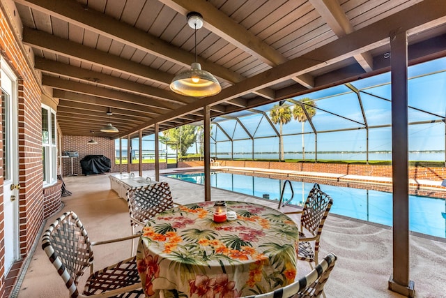 view of swimming pool featuring a grill