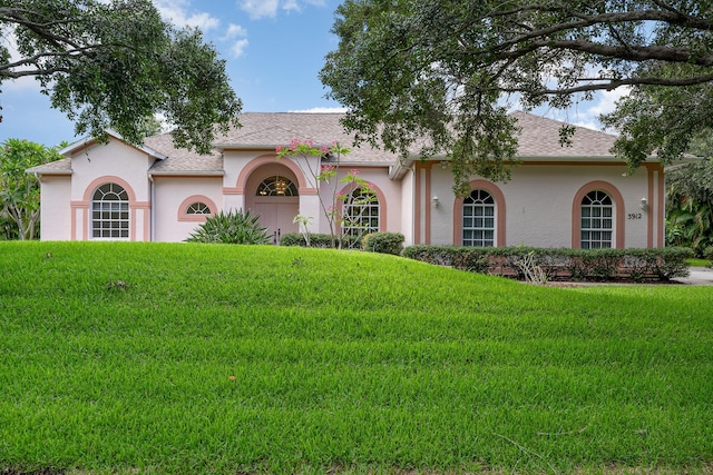 view of front of home with a front yard