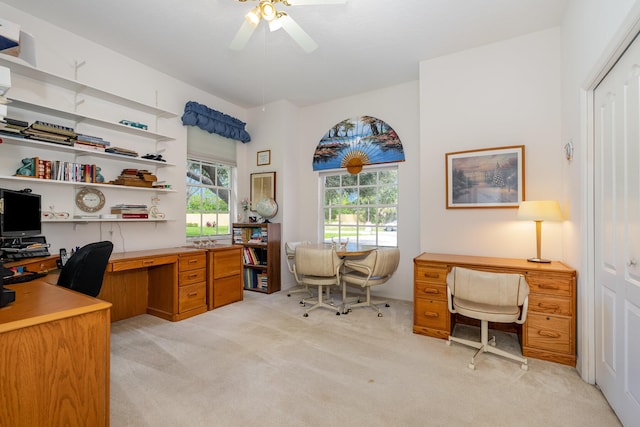 office featuring light carpet and ceiling fan