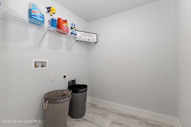 laundry room with washer hookup and hookup for an electric dryer