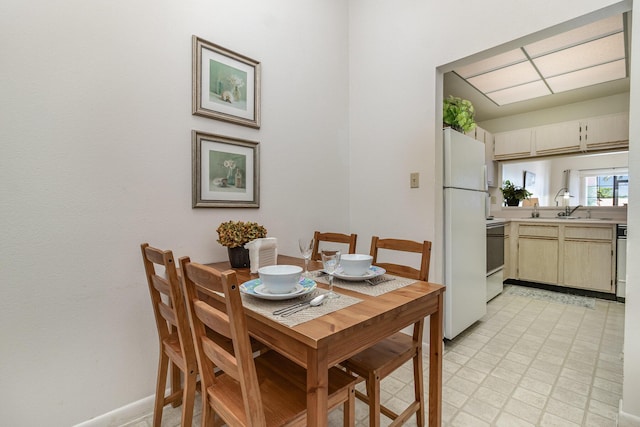 dining space with sink