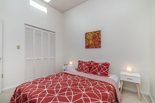 carpeted bedroom featuring a closet