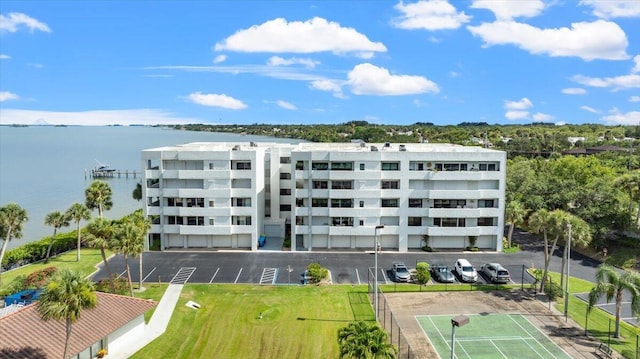 view of building exterior featuring a water view