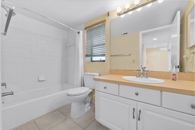 full bathroom featuring tile patterned flooring, vanity, shower / bath combo, and toilet