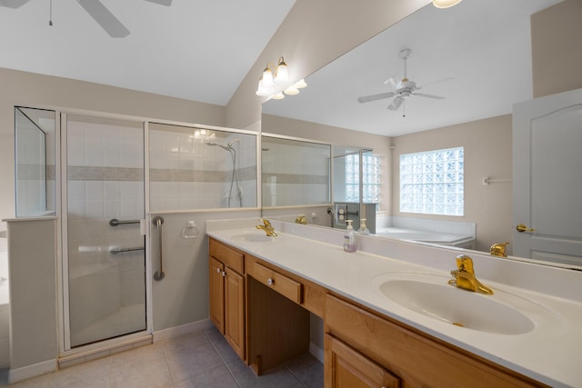 bathroom featuring tile patterned floors, vanity, ceiling fan, and plus walk in shower