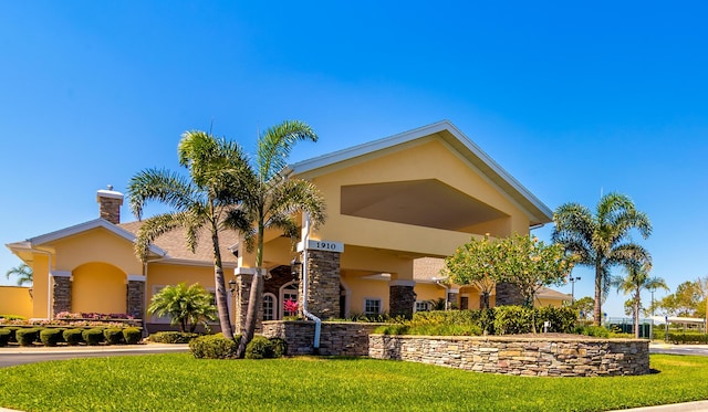 view of front of house with a front yard