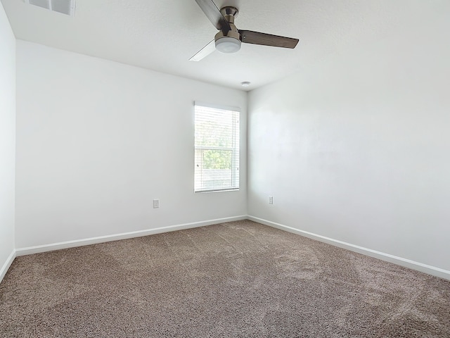 carpeted empty room with ceiling fan