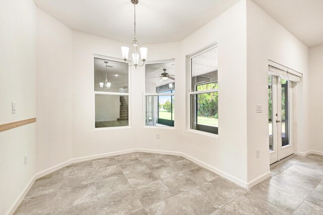 spare room with an inviting chandelier