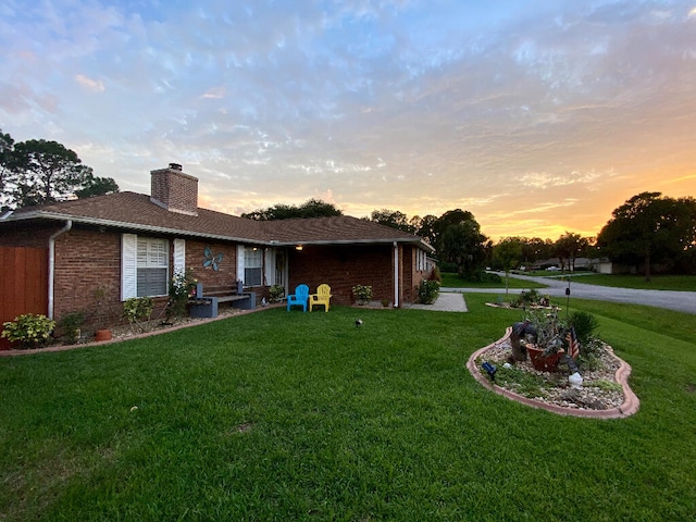 exterior space with a yard