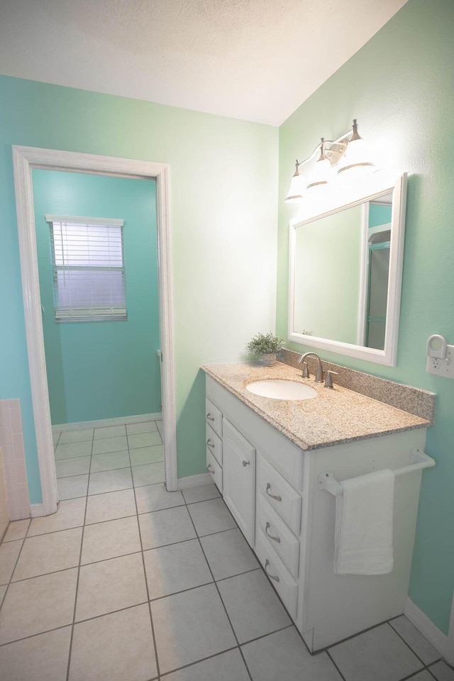 bathroom featuring vanity and tile patterned floors