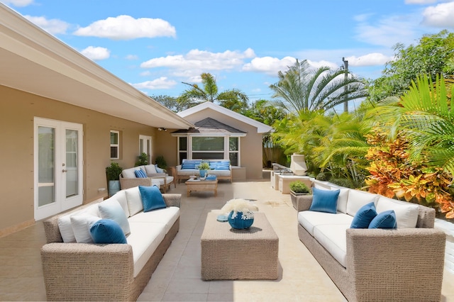 view of patio featuring french doors and an outdoor living space