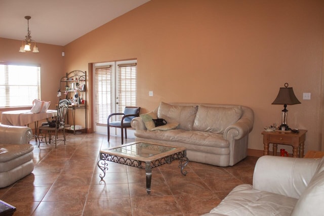 living room featuring tile patterned flooring and high vaulted ceiling