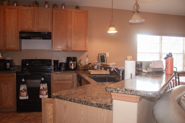 kitchen featuring hanging light fixtures, tile patterned floors, sink, kitchen peninsula, and black appliances