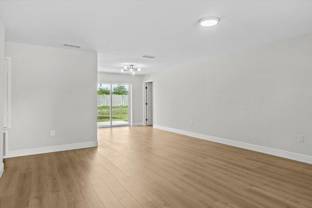 empty room featuring light hardwood / wood-style floors