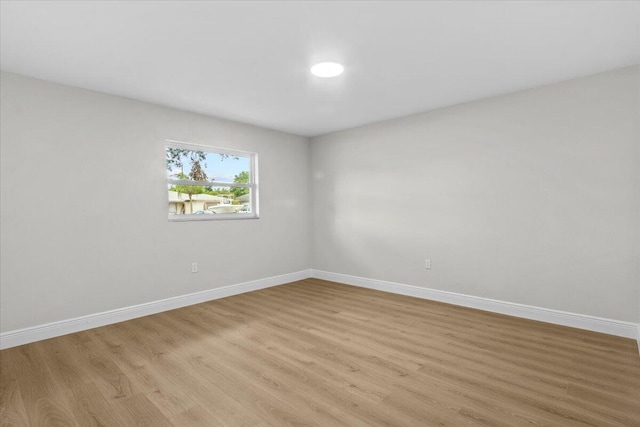 empty room with light wood-type flooring