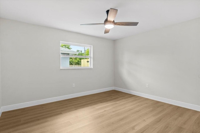 unfurnished room with light hardwood / wood-style flooring and ceiling fan