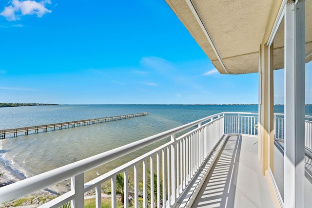 balcony featuring a water view